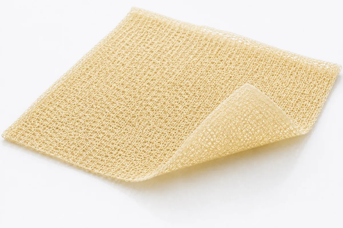 A pad of knitted oxidised regenerated cellulose, the fabric form of an absorbable haemostat.